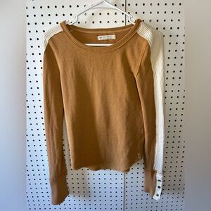 We are free by free people 
Brown and White Long Sleeve Sweater
